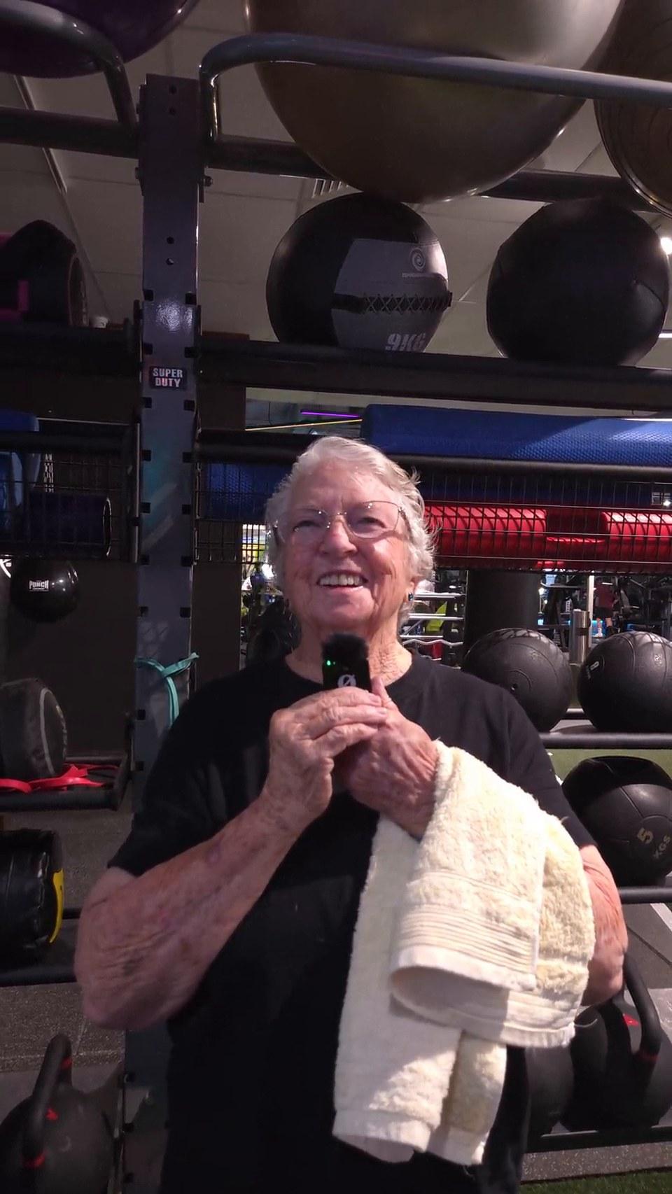 Esmee Cross, 85, smiling to camera at I Feel Good 24:7 in Coopers Plains